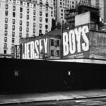 grayscale photo of city buildings